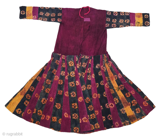 An Exceptional Thigma Tie & Dye Costume (Coat)
from the women of Zanskar, Ladakh. India.

This rare example is crafted from handwoven yak wool, featuring a deep natural indigo blue alongside other organic dyes.  ...