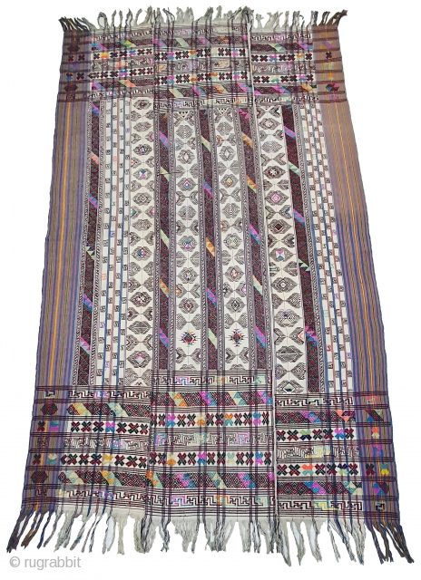 Kira (woman's wrap),Probably woven in Bumthang, Bhutan. It consists of three panels joint to form one single cloth. The delicate weaving n patterning consists of motifs that are popular in other textiles  ...