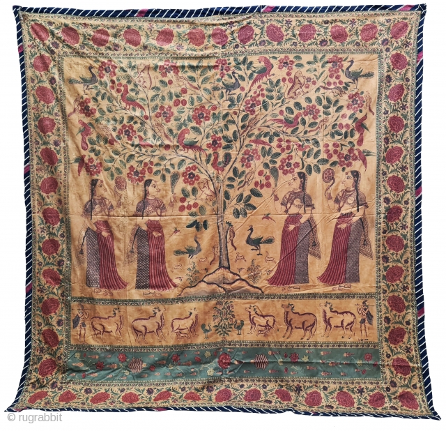 An Roller Print Pichwai depicting the Lord in the form of a tree with abundance and life. It's flanked by Gopis on both sides venerating the divine and the lower register shows  ...