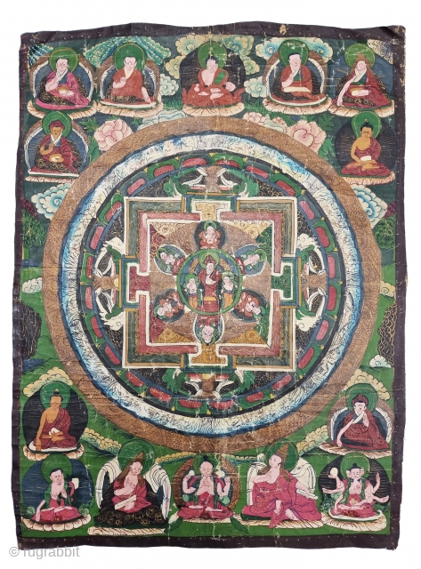 
Tibetan Buddhist  Mandala Thangka Painting From Tibet .
Distemper on cloth; recto with Tibetan inscriptions in gold identifying the various figures.

C.19th Century .

Its size is 43cmX56cm (20230728_165918).      