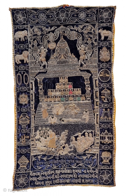 A Rare Jain Temple Hanging, From Gujarat in Northwest India. India

Its size is 77cmX132cm.

Weight is 2 Kgs 090 Gm

C.1900.- 1945.

This form of embroidery is called zardosi work. A Indigo Blue  velvet cloth has been  ...