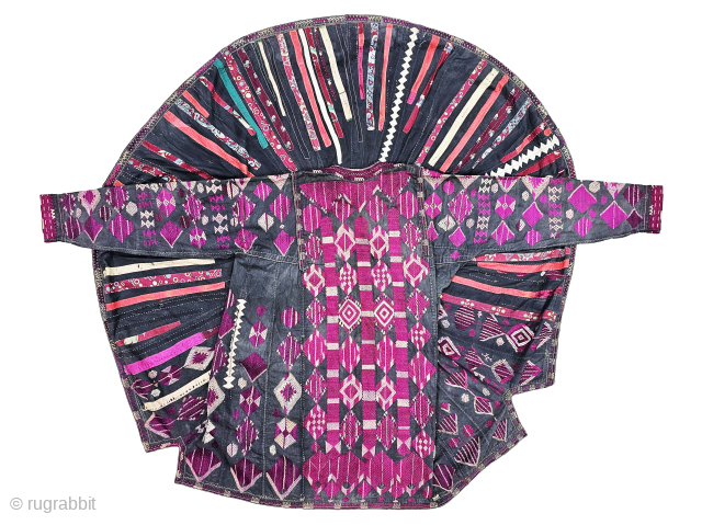 An  Rare Waziristan Khyber dress, Pakistan.

This is a long-sleeved dress featuring dozens of darted embroidered and Printed Panels.

late 19th century (20250826_150736). Please email me at kutcharts1@gmail.com.      