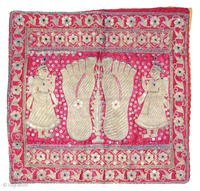 A Gujarat Silk Wall Hanging Puthia  Depicting the Feet of aJain Monk,  From Gujarat, India. Real Zari (Gold and Silver ) Embroidery on the Silk.

The presence of the holy teacher  ...