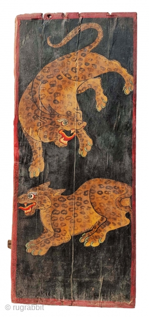 Dramatically Painted doors depicting symbols of Tibetan mythology such as Tigers Dragons and Lamas From Tibet. C.1875-1900. Its size. is 72cmX161cm (20221031_144434 ).          