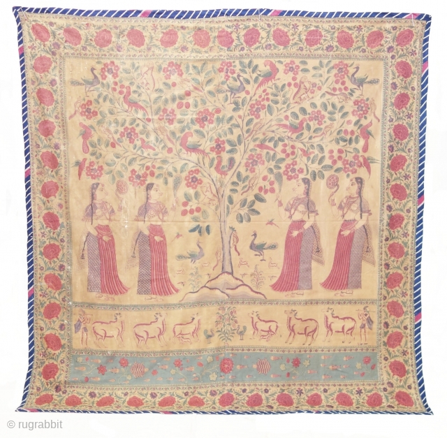 An Roller Print Pichwai depicting the Lord in the form of a tree with abundance and life. It's flanked by Gopis on both sides venerating the divine and the lower register shows  ...