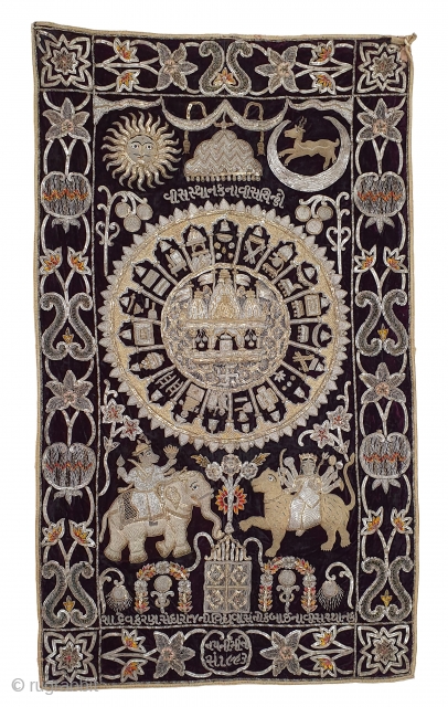 Jain Temple Hanging, Patan Gujarat, India. C.1900. Silver and gold gilt embroidery Cotton-Velvet. Its size is 77cmX123cm.   
This a holy piece, showing the Sun and Moon with twenty different marks  ...