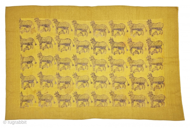 Pichwai Fragment for the Gopashtami From Gujarat India. Silver-tinsel Stamped with gum on Yellow Muslin cotton.

Circa 1875-1900.

Its size is 50cmX80cm  (20231226_142039).           