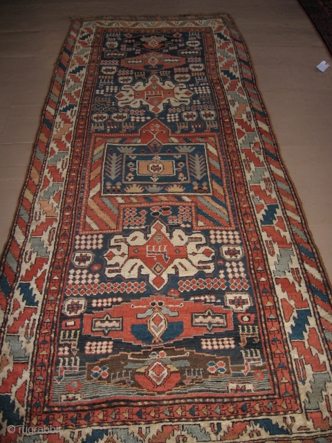 The Kurdish woman who wove this rug in the last quarter of the 19th C. either lived next door to a rug store or traveled through the Caucases and developed rug envy.  ...