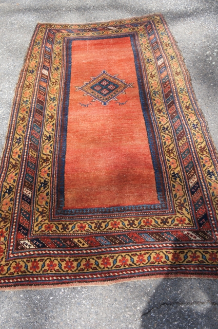 Kurdish Rug, Ca. 1900; 4' x 8'. All good colors with very good but not quite perfect pile. No cuts or reduced in either direction. Charming animals support a medallion on an  ...