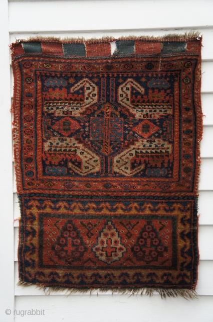 Late 19th C. Kurdish bag front, 24" X 31". Curled leaf/dragon form face with lollipop tree elem panel enclosed in a reciprocal trefoil frame. Pile generally good with pile above knot collars  ...