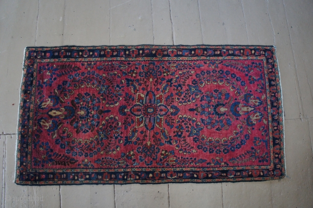 Ca. 1920 washed and painted Sarouk mat, 31" x 59". It has a very nice weave and is missing a little from the last band of blue at each end.No worn spots  ...