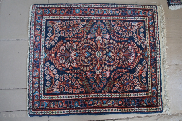 Ca. 1930 blue Sarouk, 25" x 30". Complete ends and edges with thick fluffy pile. Nice but not fancy weave. I will ship this anywhere in the lower continental states of the  ...