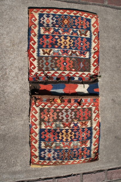 A joined pair of South Persian Kilim bags, 44" x 20". All natural colors, many closure loops, but not all, present. Condition excellent front and back. Extra photos of the back available  ...