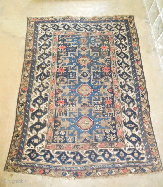 Early 20th Century Lesghi Star Caucasian 3'11" x 5'3." Lovely blue colors and mix of natural and some synthetic dyes, but no color run. Very interesting and unusal major border. Wear and  ...