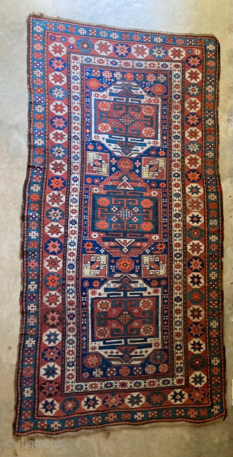Antique Caucasian Kazak 4' x 8'2". Good condition with only minor wear. Contact me directly at l_g_gerber@yahoo.com                