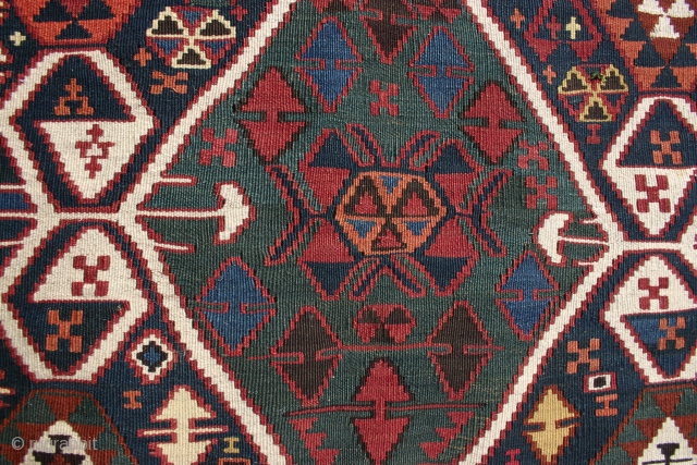 East Anatolian kelim, 1880-1900, 365-390x123-131cm. Very good colours and condition, and with a nice patina. 
It lay flat on the floor, but it is a little bana shaped. Lovely piece to hang  ...