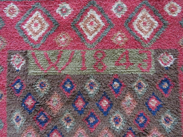 Finnish double sided ryijy rug, the front is in very good condition, signed and dated W1843, 175x135 cm. One end is folded, so it´s not reduced. Not so easy to get good  ...