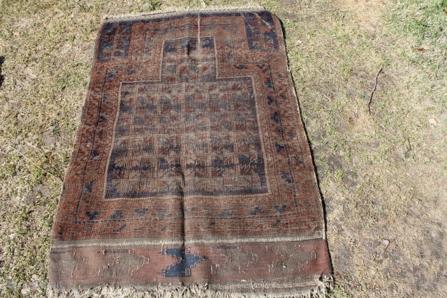 Small antique Timuri rug, bad condition, ok colours, washed.                        