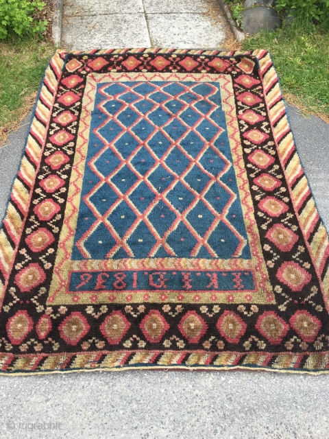 Finnish double sided wedding ryijy rug, signed and dated IKID 1836. Published as plate 5 in Finland’s Ryor by U.T. Sirelius. It’s in good overall condition having lost just a few knots.  ...