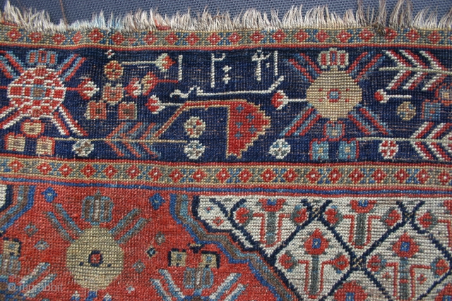 Antique Khamse rug, dated 1291 about 1870.
Wery nice border.
The rug is paperthin, a fine and beautiful study piece.
The price reflects its condition.
The rug is washed.        