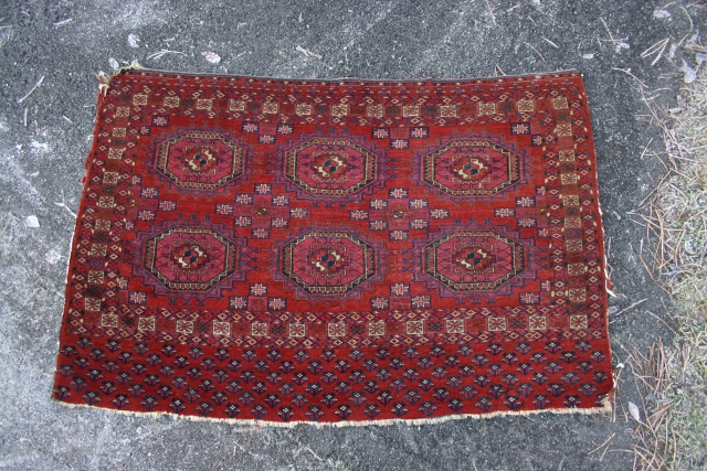 Very nice Tekke, thin and with a lot of knots, good colours, patina and it looks good too.
Pictures 3,4,5 and six taken in bright sunlight.        