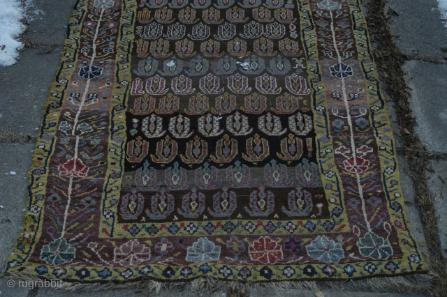 Very strange and exiting NW Persian rug, very good colours and a lot of them. Reduced at one end, 315x106 cm.
Some irregular knoting, mostly good pile and four restored areas, the biggest  ...