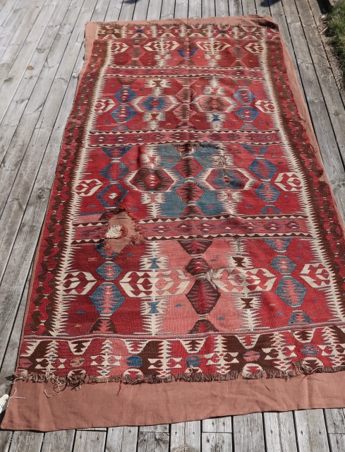 From Sonny Berntssons collection:
No 970 antique Anatolian Kilim fragment, Mut area?
127 x 250 cm. Mounted on fabric.
See detail photos of repair and damage.
More info if you ask.
NOTE: E-mails are not always delivered  ...