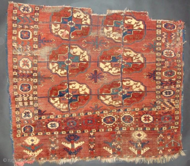 Tekke fragment, 3'1'' X 3', first half 19th century, cut and resewn on right side, fairly good pile, great color, great skirt, great soul.         