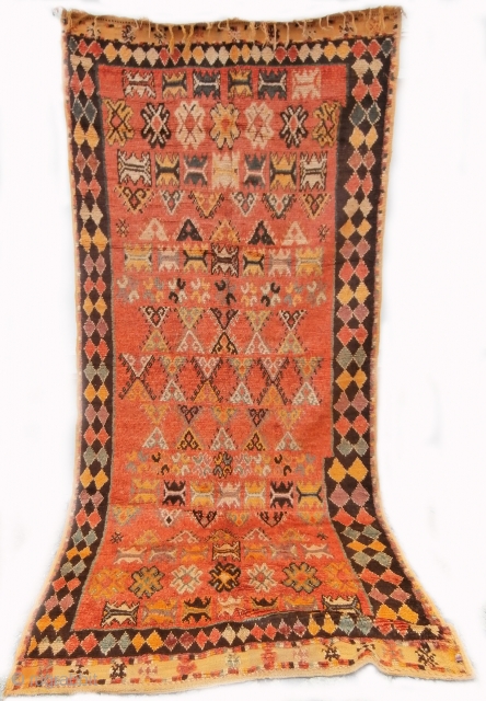 MOROCCAN BERBER HIGH ATLAS RUG with an exceptionally pleasing palette of colours and interesting design. It is an old rug dating from the mid 20th century and is from the region of  ...