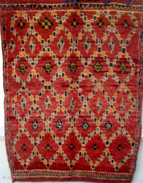 MOROCCAN RUG from the district of Rehamna in the vast area west of Marrakech known as the Haouz. The knotted pile is wool and the warps and wefts are a mixture of  ...