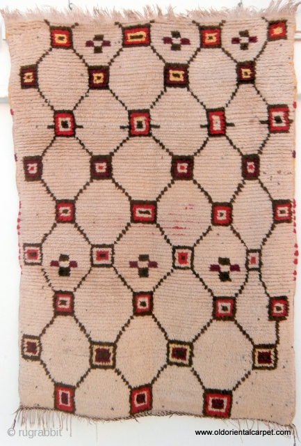 MOROCCAN BERBER HIGH ATLAS RUG A very old, soft and supple rug from the part of the High Atlas which extends from east of Marrakech to the Algerian border. Although classified as  ...