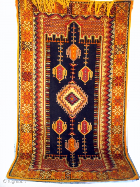 MOROCCAN HIGH ATLAS BERBER RUG from the region of Ouaouzguite, south of Marrakech. This piece has incredibly lustrous hand spun wools and a beautiful depth of rich colours, together with an intricate  ...