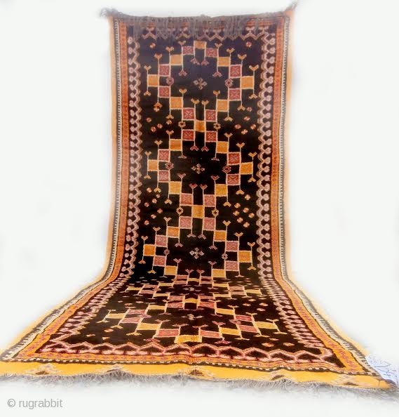 MOROCCAN BERBER HIGH ATLAS CARPET from the Ait Zenaga Berber tribe. Although the deep field color is typical of Ait Zenaga weaving the rest of the colors and design are most unusual  ...