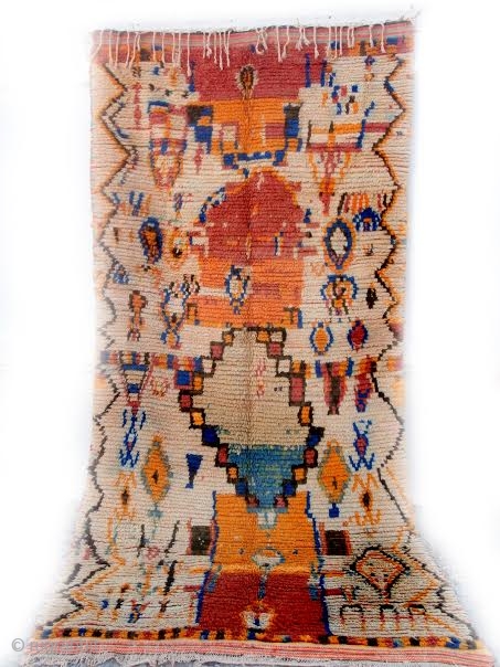 MOROCCAN BERBER RUG FROM BOUJAD. Even the Berbers of the rest of Morocco regard the weavers from Boujad in the Middle Atlas as eccentric. They adhere only to the rare, unplanned, spontaneous,  ...