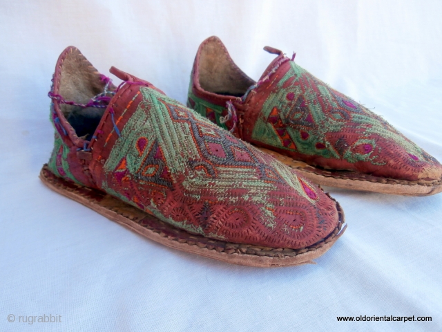 RARE MOROCCAN BERBER SHOES dating from the first half of the 20th century and which are hand made from camel leather. The embroidery is hand stitched silk. They would have been used  ...