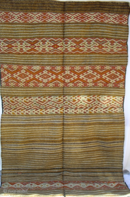 MOROCCAN MIDDLE ATLAS KILIM/BAG. Very large flat weaves such as this which have most of the embroidery on the top section are first folded horizontally into half. They are then stitched up  ...