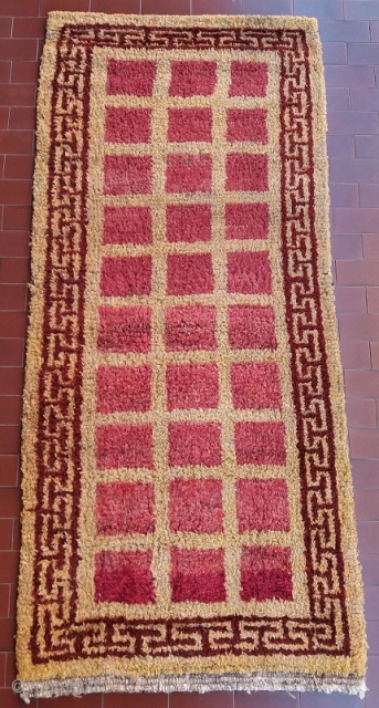 Absolutely unusual and rare Tibetan rug, khaden size (178 by 80 cm), genuine, old, complete, perfect condition, no repairs; it looks like a Wangden rug with its typical wool, knotting, structure and  ...
