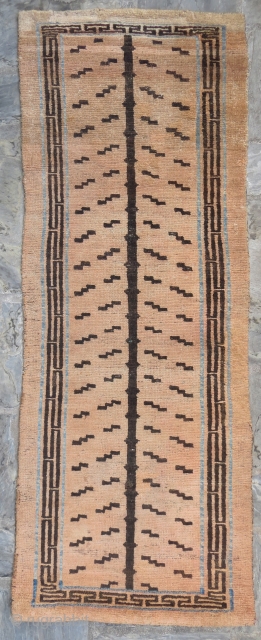 Tibetan tiger rug. Natural dyes with a line of indigo. All wool. Late 19th Century. Good condition, minor repairs. 
64cm x 175cm.           