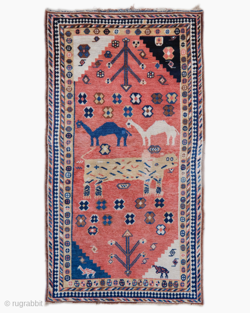 Period: Late 19th Century
Origin: Iran
Dimensions: 126 x 232 cm
This rare late 19th century Persian Gabbeh rug highlights a powerful and rhythmic zoomorphic composition featuring a monumental, stylized lion or “leopard” figure accompanied ...