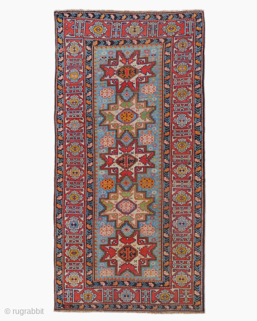 Period: Mid 19th Century
Origin: Caucasus
Dimensions: 102 x 200 cm
This rare middle of the 19th century Caucasian Lezgi rug highlights a powerful and rhythmic geometric composition featuring a vertical sequence of five monumental, ...