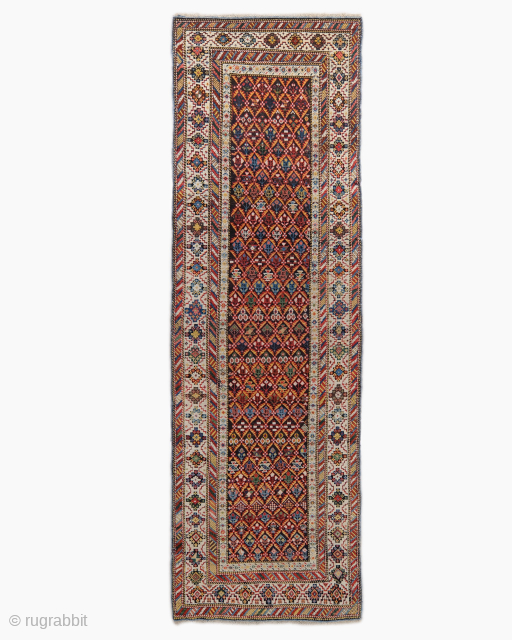 Period: Late 19th Century
Origin: Kuba-Shirvan, Caucaus
Dimensions: 103 x 325 cm
This rare late 19th century Caucasian Kuba Shirvan runner highlights a powerful and rhythmic geometric composition featuring an all over “lattice” or “honeycomb” ...
