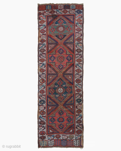 Period: 19th Century
Origin: Konya, Turkey
Dimensions: 135 x 410 cm
This rare 19th century Turkish Konya runner is a vibrant celebration of Central Anatolian tribal art, showcasing a rhythmic and powerful geometric composition. The ...