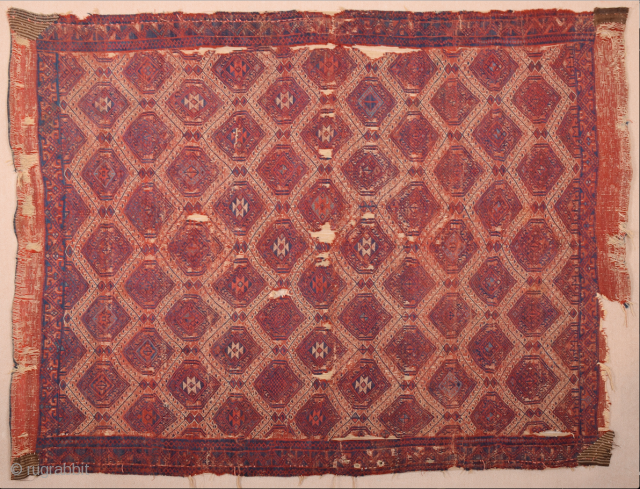 This red-ground Yüncü kilim featuring a deep blue field design of three geometric, stylised trees and a narrow border echoing the shapes of the trees is a visual masterpiece. The reduction to  ...