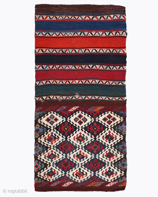 Period: Mid 19th Century
Origin: East Anatolia
Dimensions: 71 x 135 cm

This rare mid 19th century East Anatolian heybe highlights a powerful and rhythmic tribal composition featuring a striking juxtaposition of wide horizontal color  ...