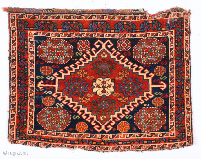 Half of a double bag by the Luri from the Fars area. The design is strongly influenced by Qashqai models, but the coarser weave, with red wool wefts, reveals the Luri origin.  ...