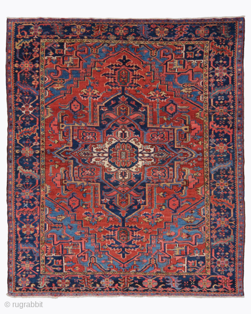 Period: Late 19th Century
Origin: Heriz
Dimensions: 225 x 270 cm

This rare late 19th century Persian Heriz rug highlights a powerful and rhythmic geometric composition featuring a massive centralized medallion anchored within a vibrant  ...