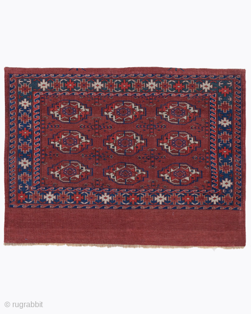 Period: Mid 19th Century
Origin: Turkmenistan
Dimensions: 113 x 87 cm
This rare mid 19th century Karadashli chuval highlights a powerful and rhythmic geometric composition featuring a vertical sequence of three primary medallions anchored within ...