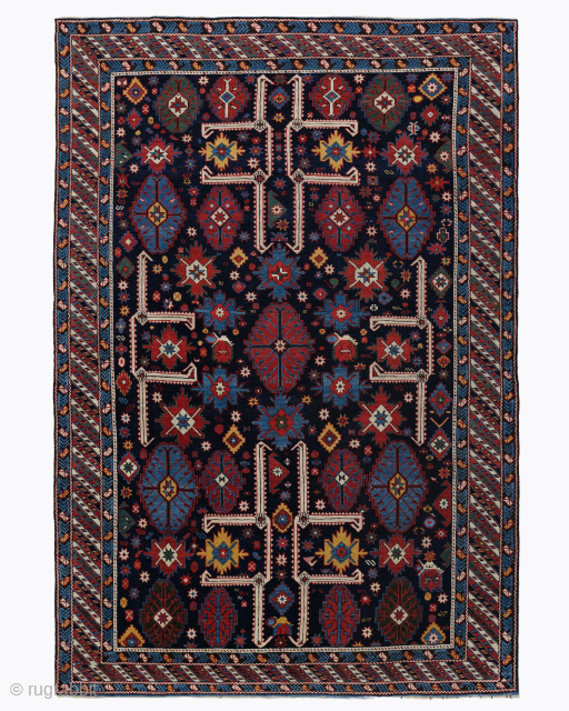 Period: Late 19th Century
Origin: Caucasus
Dimensions: 135 x 200 cm

This rare late 19th century Caucasian Shirvan rug highlights a powerful and rhythmic geometric composition featuring a vertical series of large scale ivory medallions  ...