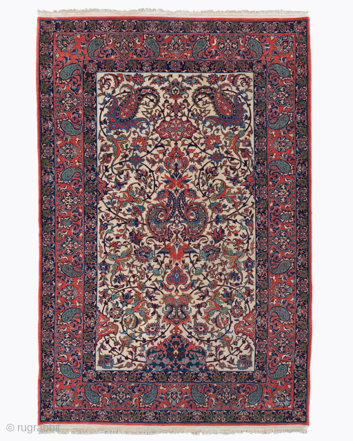 Period: Late 19th Century
Origin: Isfahan
Dimensions: 145 x 200 cm

This rare late 19th century Persian Isfahan rug highlights a powerful and rhythmic floral composition featuring a centralized botanical arrangement anchored within a luminous  ...