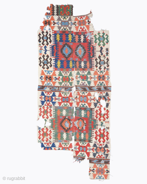 Period: Early 19th Century
Origin: Central Anatolia
Dimensions: 112 x 235 cm
This rare early 19th century Central Anatolian kilim fragment highlights a powerful and rhythmic geometric composition featuring a series of bold, nested diamond ...